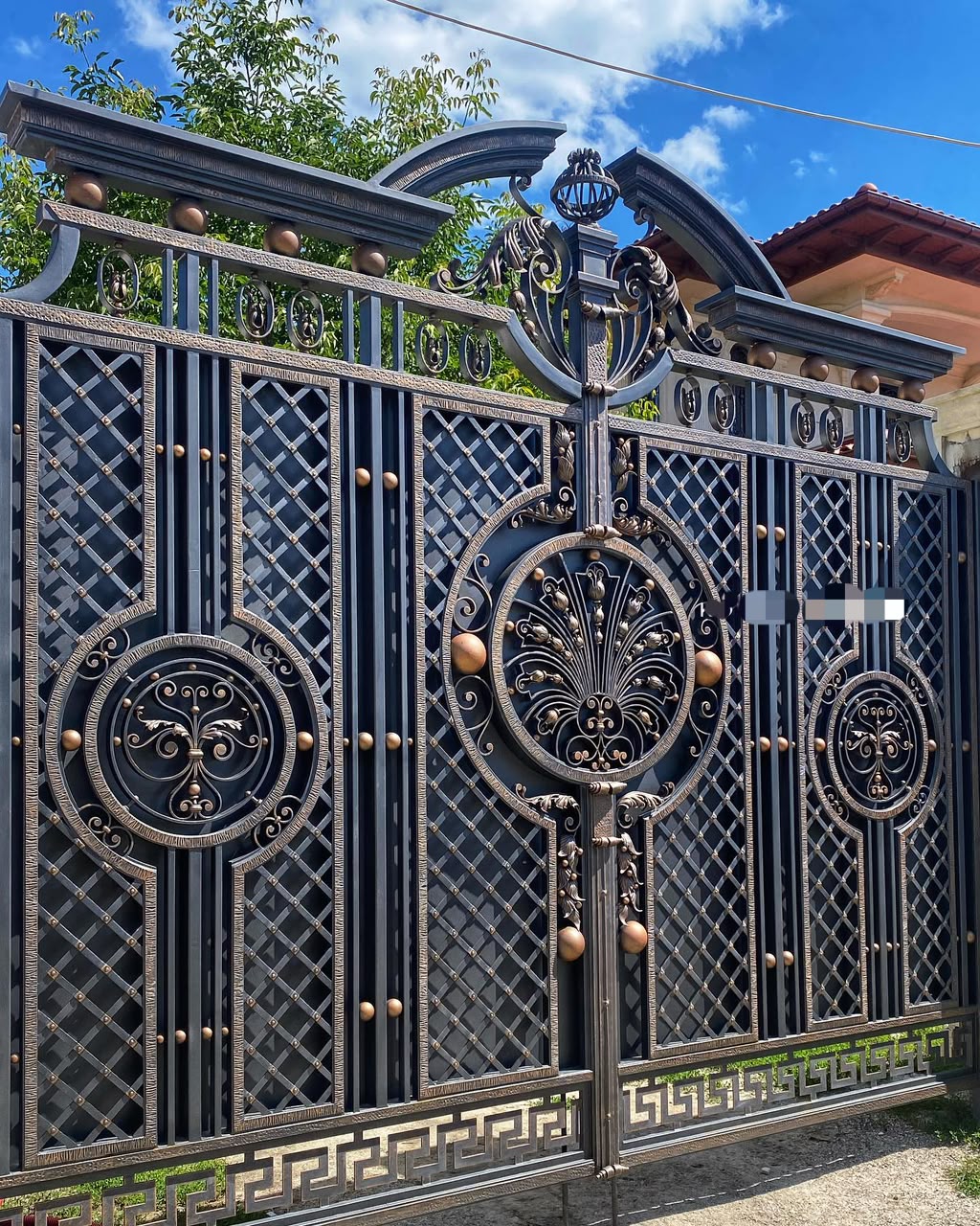 Custom wrought iron gate fabricated and installed by Atiliandozzy Global